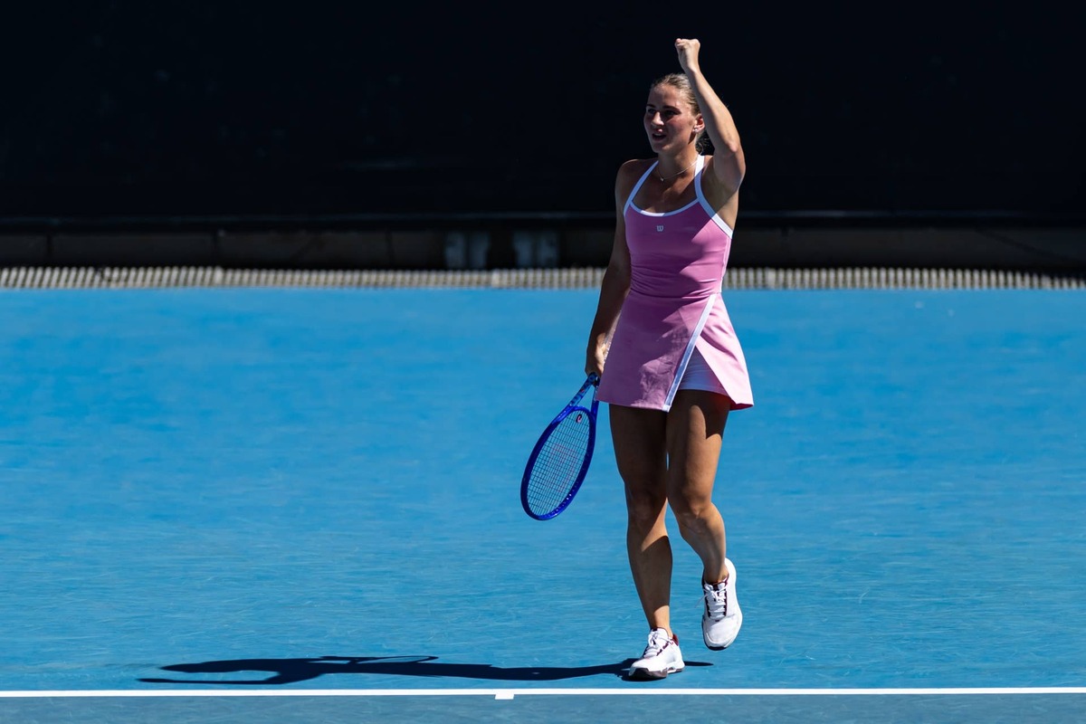  Jan 18, 2026; Melbourne, Victoria, Australia; Marta Kostyuk of Ukraine in action against Elsa Jacquemot of France in the first round of the women's singles at the Australian Open at ANZ Arena in Melbourne Park. Mandatory Credit: Mike Frey-Imagn Images 