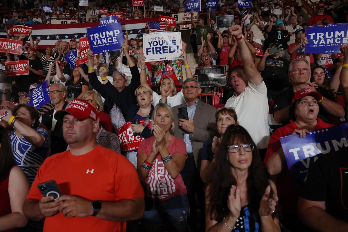  Supporters watch Republican presidential nominee and former President Donald Trump speak at a rally on July 31, 2024, in Harrisburg, Pennsylvania. (Photo by Spencer Platt/Getty Images) 