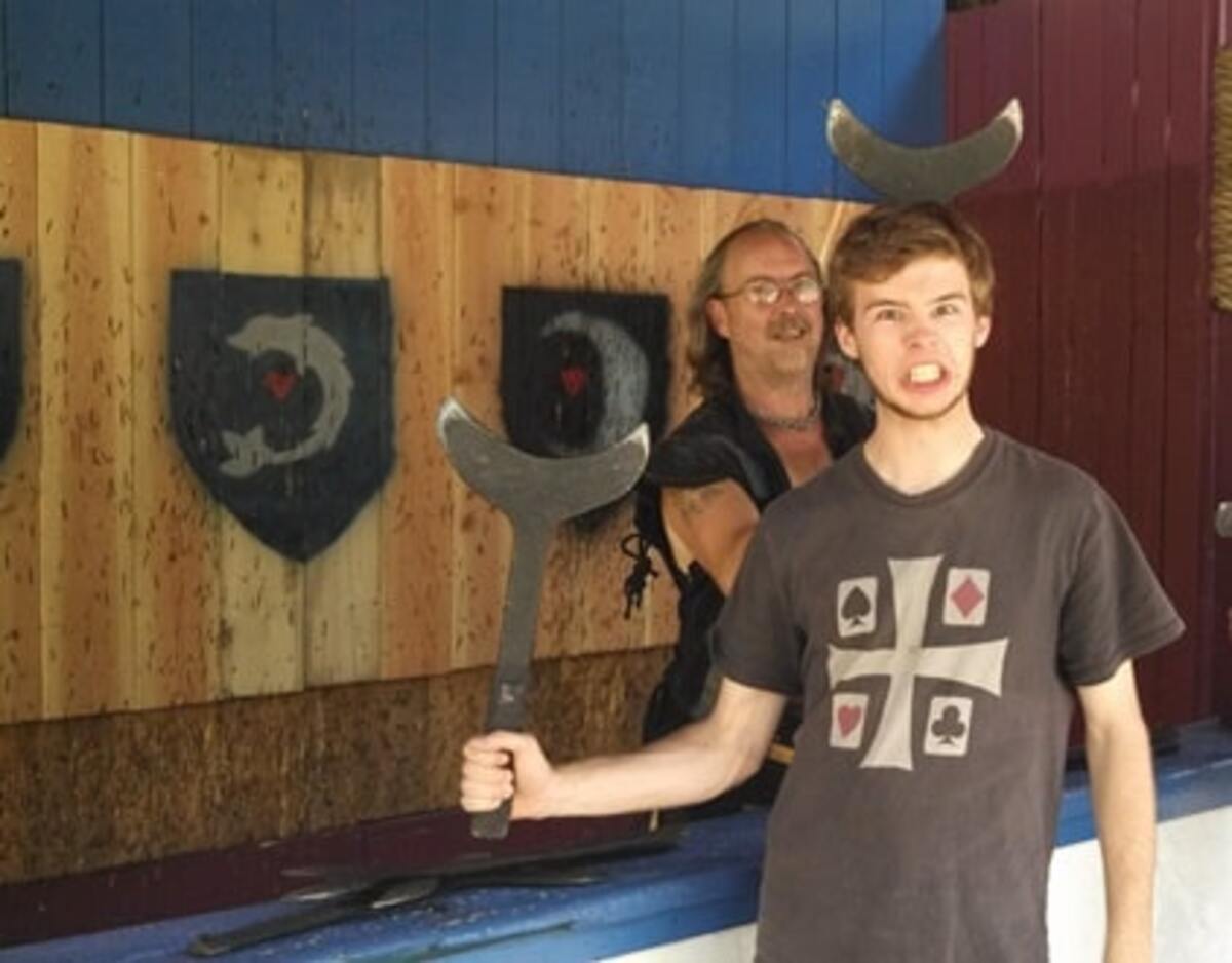  19-year-old Evan thinks he’s tough wielding that ax. Photo credit: Cindy Richards 
