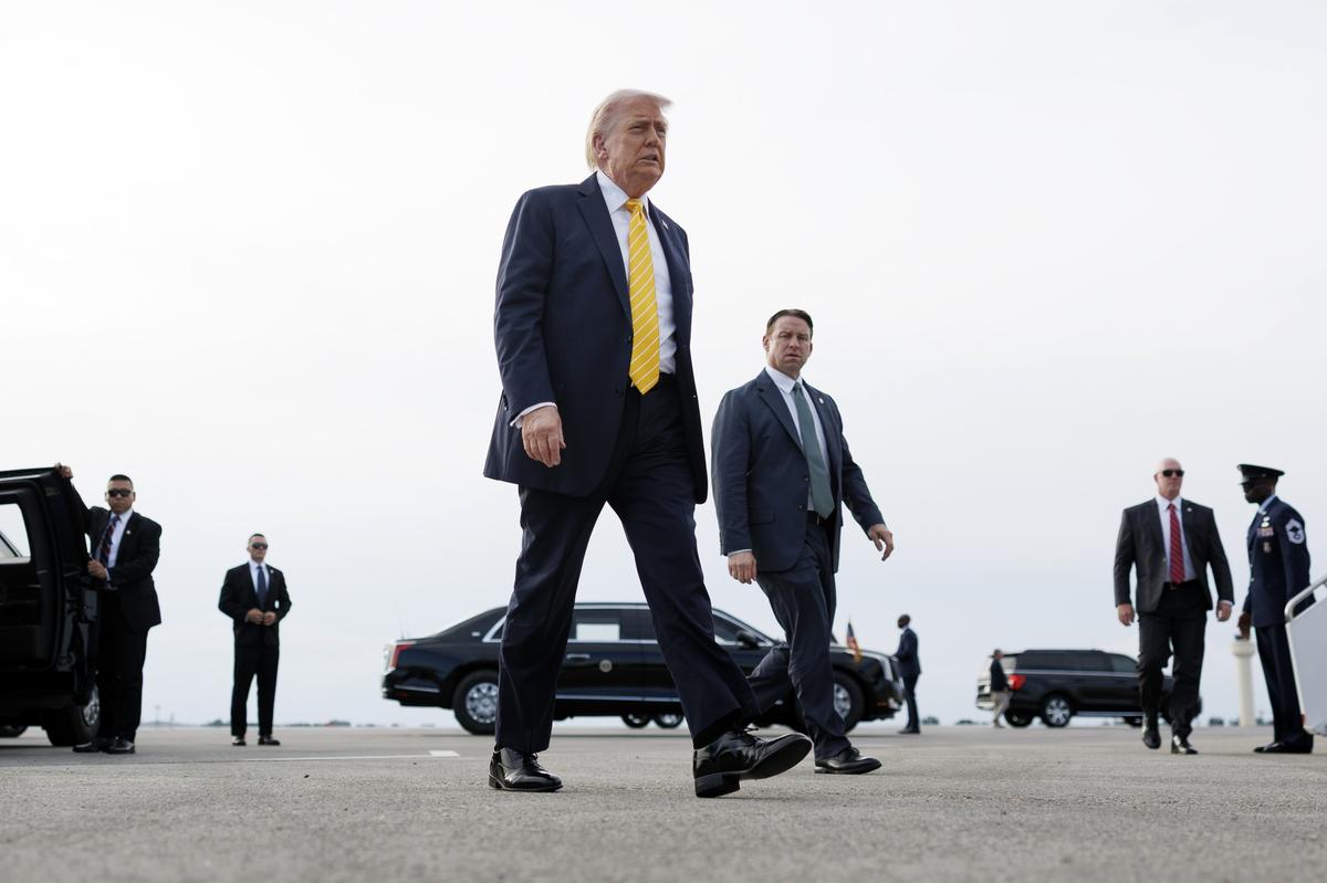 President Donald Trump arrives to speak to reporters at Palm Beach International Airport in West Palm Beach, Fla., on Saturday, May 2, 2026. Trump again put pressure on Iran on Wednesday, May 6, 2026, to agree to a deal to end the war, offering safe passage for all vessels through the Strait of Hormuz if Iran "agrees to give what has been agreed," without offering details about what those apparent concessions were. (Tom Brenner/The New York Times)