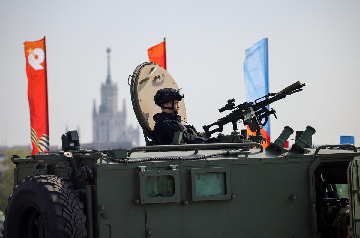 A Russian security officer remains atop an all-terrain infantry mobility vehicle amid increased security measures taken ahead of Victory Day, marking the anniversary of victory over Nazi Germany in World War Two, in central Moscow, Russia, May 7, 2026. REUTERS/Stringer
