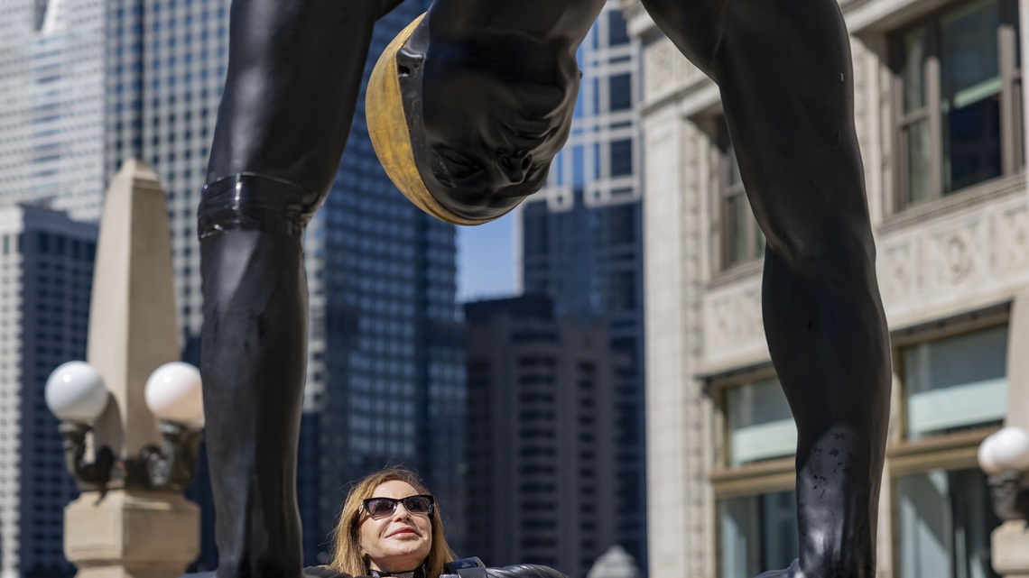 Swimmer sculptures arrive on Chicago’s Michigan Avenue for the summer