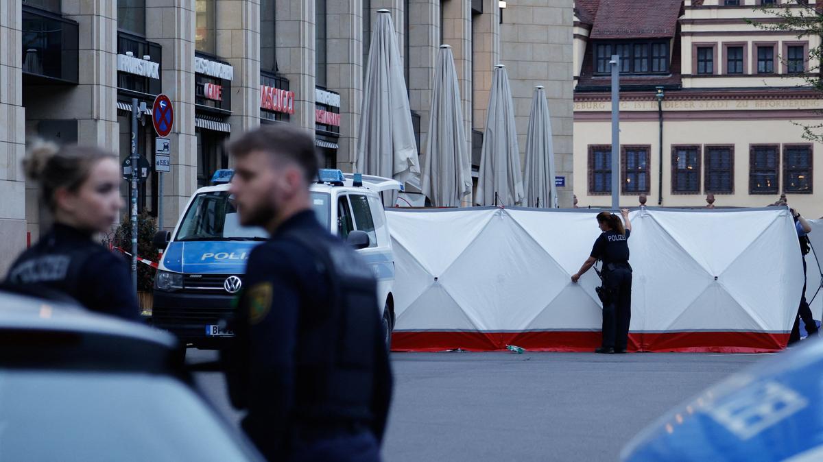 Police officers work at a site where a car drove into a group of people, in Leipzig, Germany, May 4, 2026.  REUTERS/Axel Schmidt
