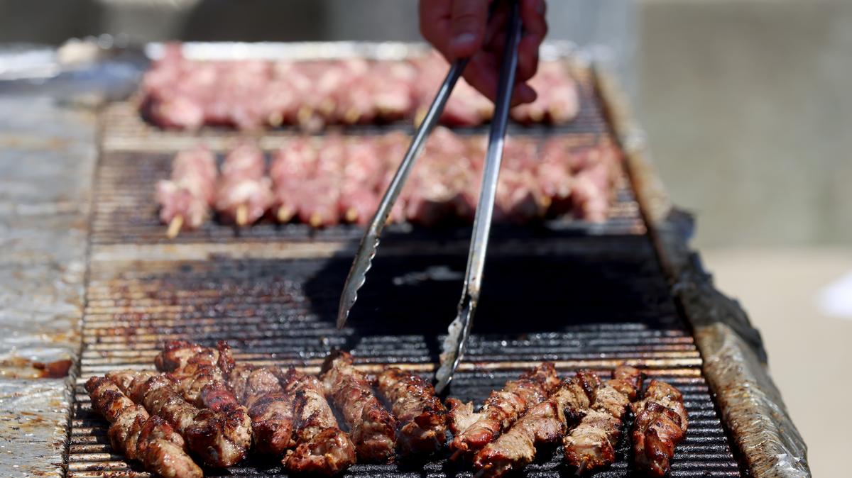 Lamb skewers are grilled during the Oakland Greek Festival at the Ascension Cathedral in Oakland on Sunday, May 19, 2024. (Jane Tyska/Bay Area News Group)