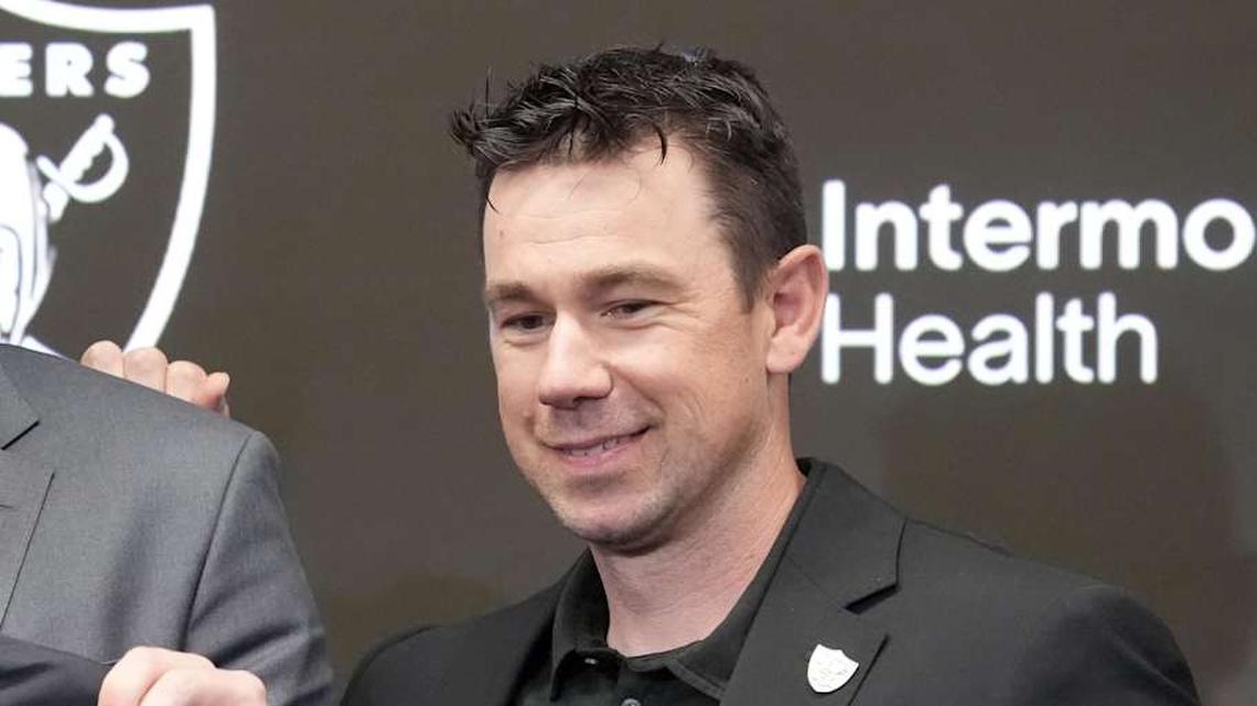  Apr 24, 2026; Henderson, NV, USA; Las Vegas Raiders quarterback Fernando Mendoza (center) poses with general manager John Spytek (left) and head coach Klint Kubiak at introductory press conference at Intermountain Health Performance Center after being selected as the No. 1 pick in the 2026 NFL Draft. Mandatory Credit: Kirby Lee-Imagn Images | Kirby Lee-Imagn Images 