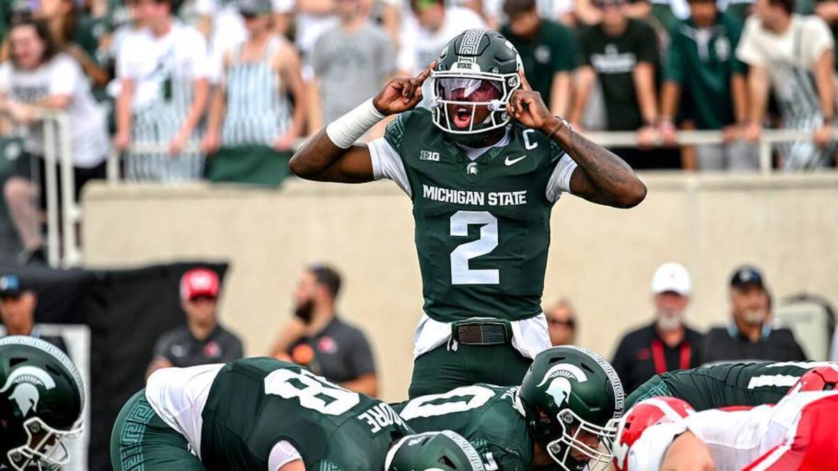  Michigan State's Aiden Chiles communicates with teammates before the snap against Youngstown State during the second quarter on Saturday, Sept. 13, 2025, at Spartan Stadium in East Lansing. | USA TODAY Network via Reuters Connect 