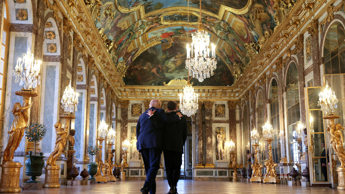 U.S. President Donald Trump receives a tour of Chateau de Versailles from President of France Emmanuel Macron ahead of a dinner on June 17, 2026. Anna Moneymaker/Pool via REUTERS