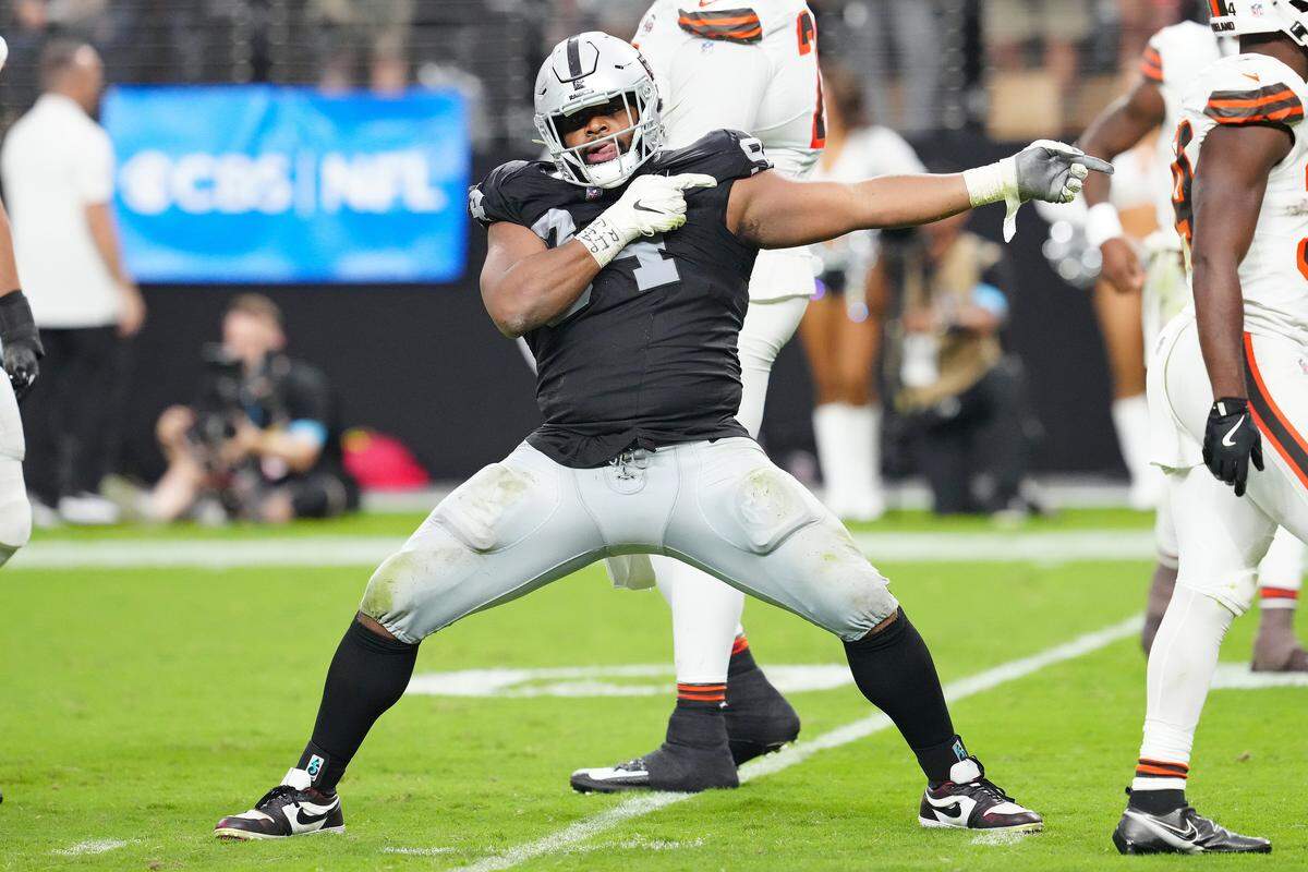 Sep 29, 2024; Paradise, Nevada, USA; Las Vegas Raiders defensive tackle Christian Wilkins (94) celebrates after a penalty overturned a scoring play by the Cleveland Browns during the fourth quarter at Allegiant Stadium.