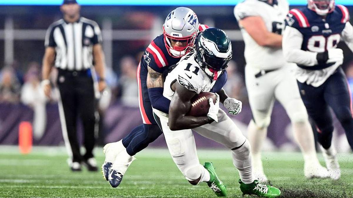  Sep 10, 2023; Foxborough, Massachusetts, USA; Philadelphia Eagles wide receiver A.J. Brown (11) is tackled by New England Patriots cornerback Christian Gonzalez (6) during the second half at Gillette Stadium. Mandatory Credit: Brian Fluharty-Imagn Images | Brian Fluharty-Imagn Images 