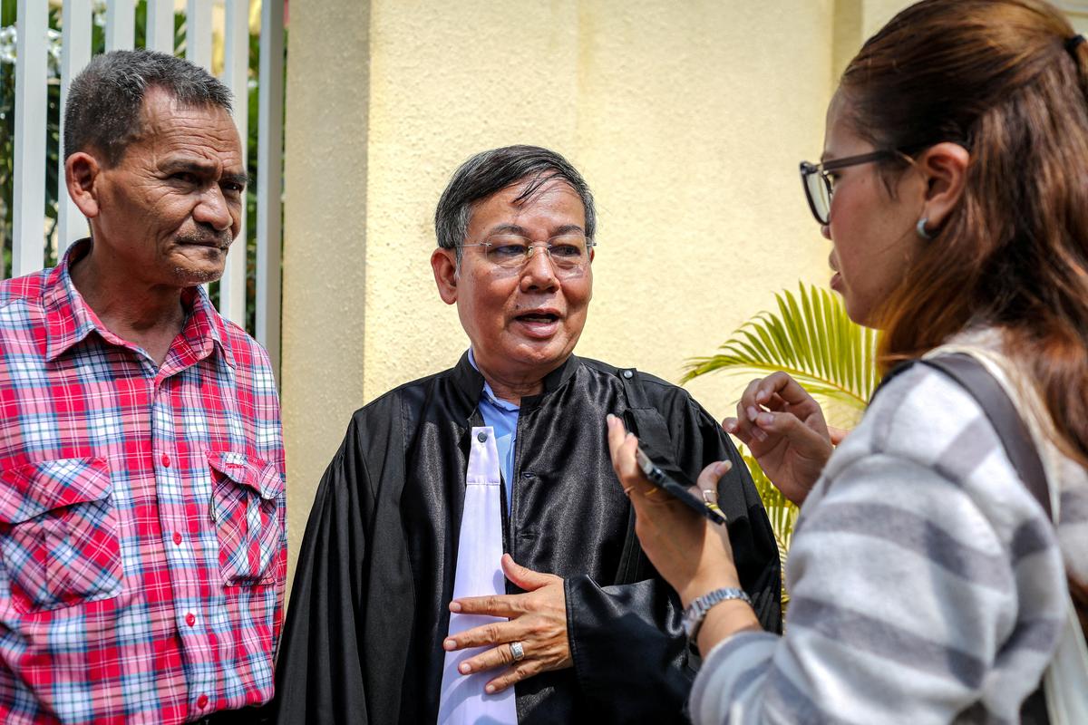 FILE PHOTO: Pheng Heng, a lawyer for opposition leader Kem Sokha, speaks to media at the Phnom Penh Appeal Court in Phnom Penh, Cambodia, April 30, 2026. REUTERS/Roun Ry/File Photo