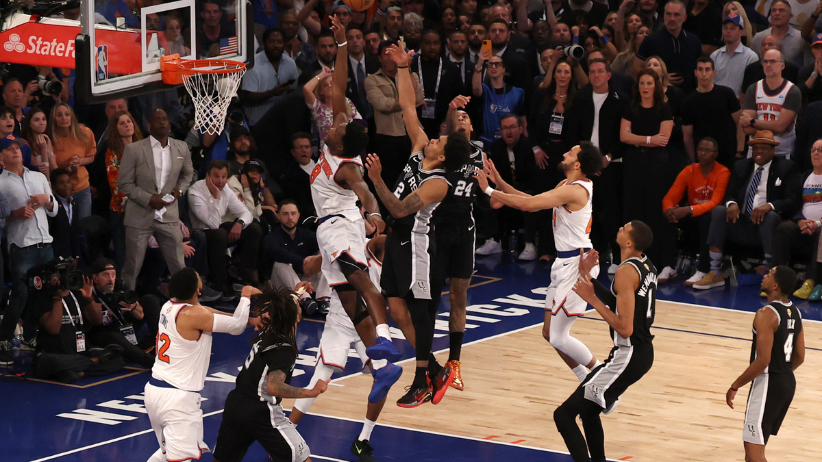 Jun 10, 2026; New York, New York, USA; New York Knicks forward Og Anunoby (8) scores on a rebound against San Antonio Spurs guard Dylan Harper (2) in the fourth quarter during game four of the 2026 NBA Finals at Madison Square Garden. Mandatory Credit: Geoff Burke-Imagn Images