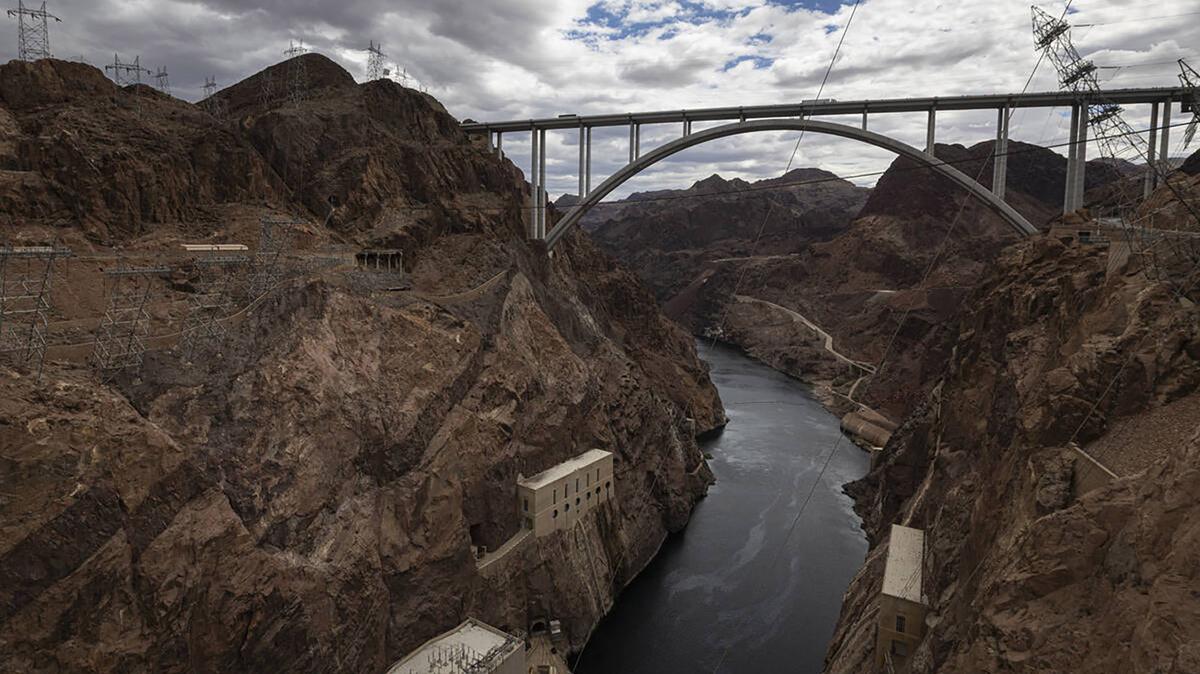The O'Callaghan-Tillman Memorial Bridge spans the Colorado River as it flows out from Hoover Dam on April 26, 2026, outside of Las Vegas. (Chase Stevens/Las Vegas Review-Journal/TNS)