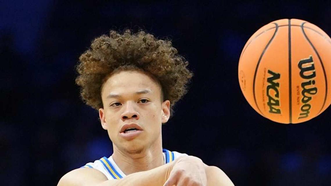  Mar 20, 2026; Philadelphia, PA, USA; UCLA Bruins guard Trent Perry (0) makes a pass against the UCF Knights in the first half during a first round game of the men's 2026 NCAA Tournament at Xfinity Mobile Arena. Mandatory Credit: Kyle Ross-Imagn Images | Kyle Ross-Imagn Images 
