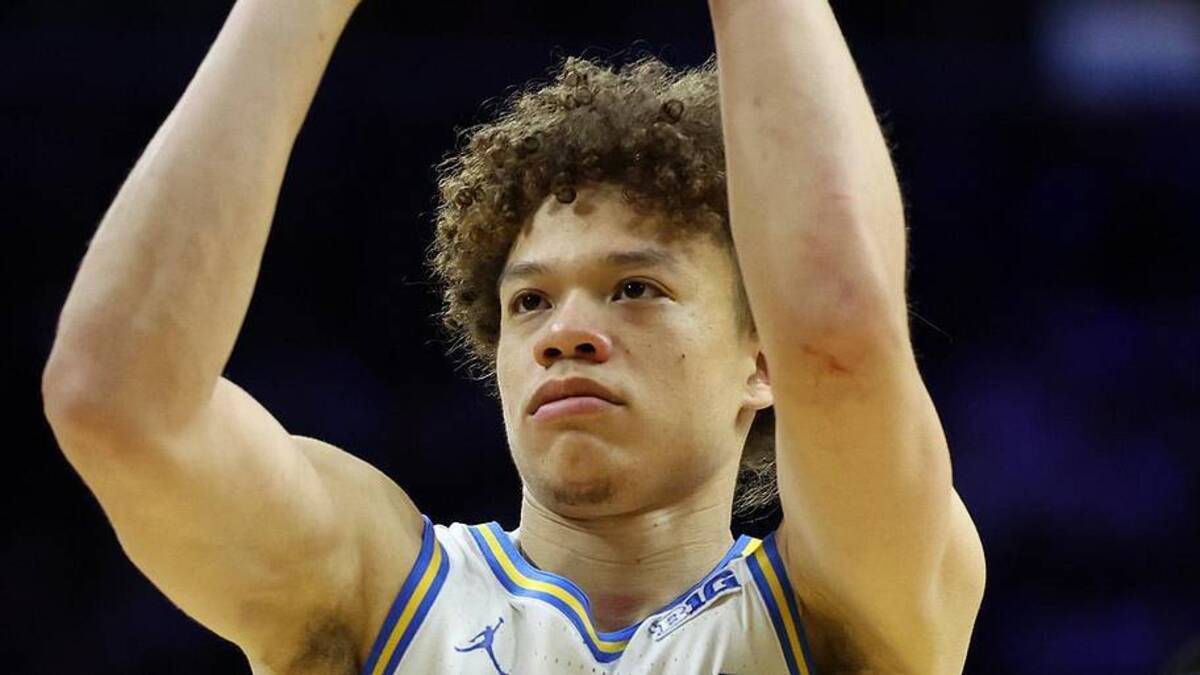  Mar 20, 2026; Philadelphia, PA, USA; UCLA Bruins guard Trent Perry (0) shoots the ball in the second half during a first round game of the men's 2026 NCAA Tournament at Xfinity Mobile Arena. Mandatory Credit: Bill Streicher-Imagn Images | Bill Streicher-Imagn Images 