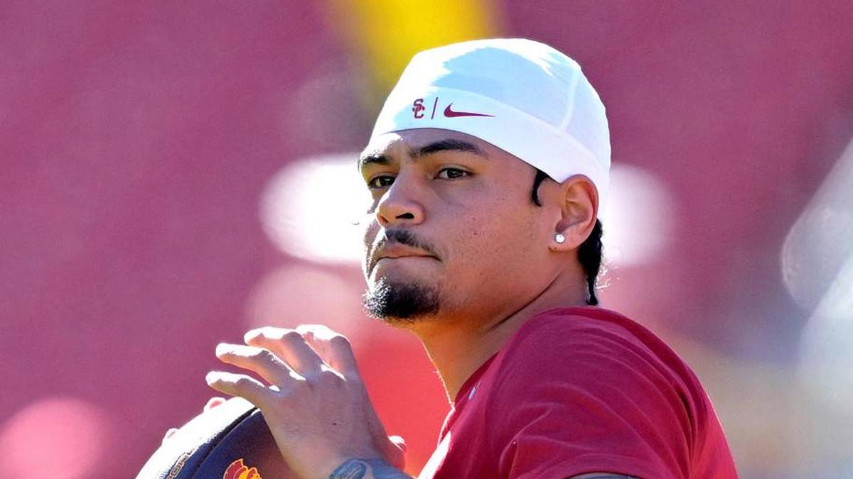  Oct 11, 2025; Los Angeles, California, USA; USC Trojans quarterback Jayden Maiava (14) warms up prior to the game against the Michigan Wolverines at United Airlines Field at the Los Angeles Memorial Coliseum. Mandatory Credit: Jayne Kamin-Oncea-Imagn Images | Jayne Kamin-Oncea-Imagn Images 
