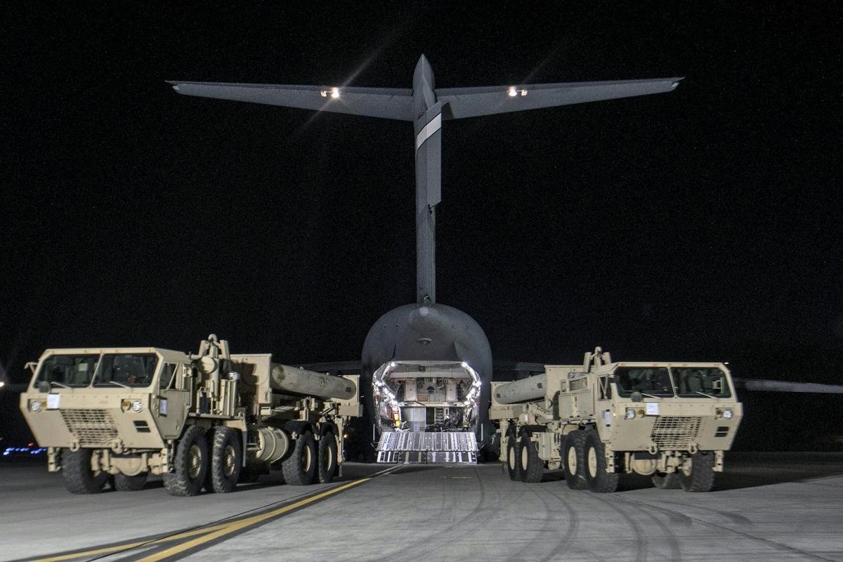  Trucks carry parts of U.S. missile launchers and other equipment needed for the THAAD missile defense system at Osan Air Base, South Korea, in 2017. NurPhoto/Contributor/Getty Images 