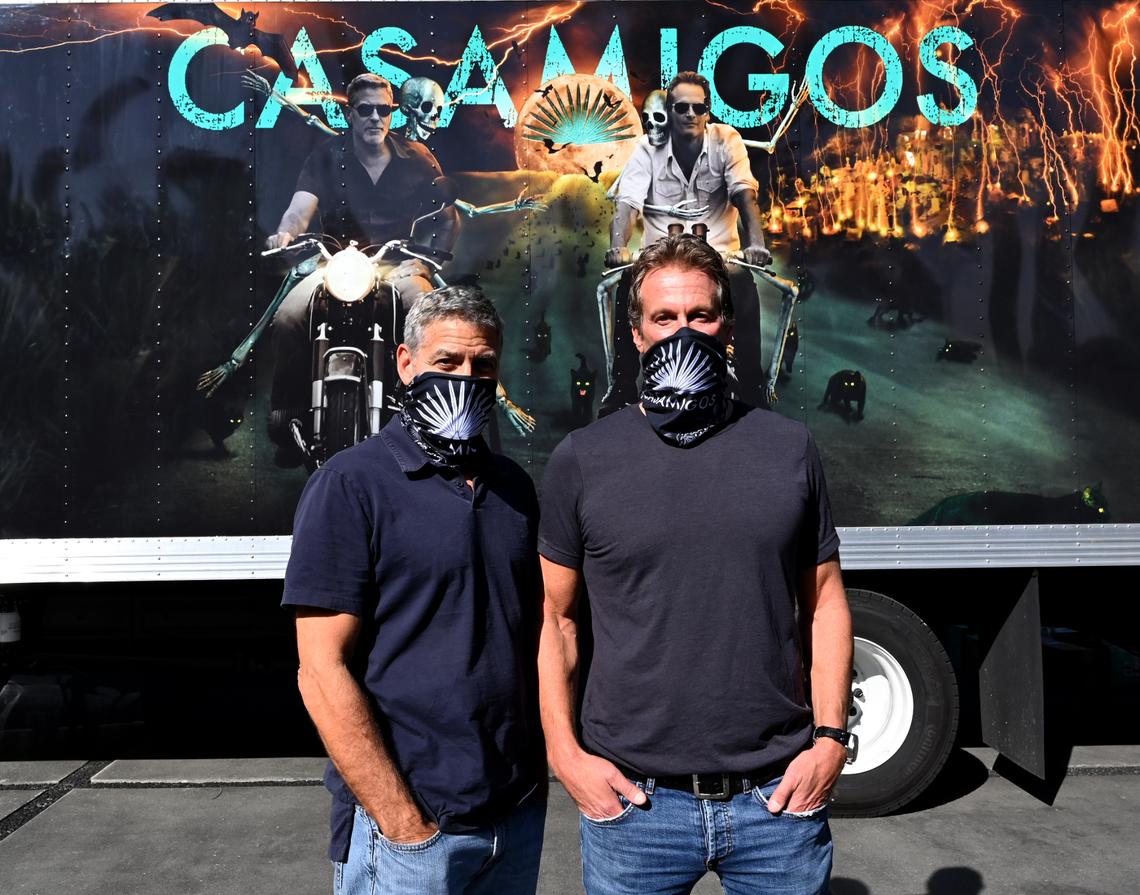 LOS ANGELES, CALIFORNIA - OCTOBER 30: (L-R) George Clooney and Rande Gerber prepare Casamigos Halloween Comes to You in Los Angeles, California. (Photo by Kevin Mazur/Getty Images for Casamigos)