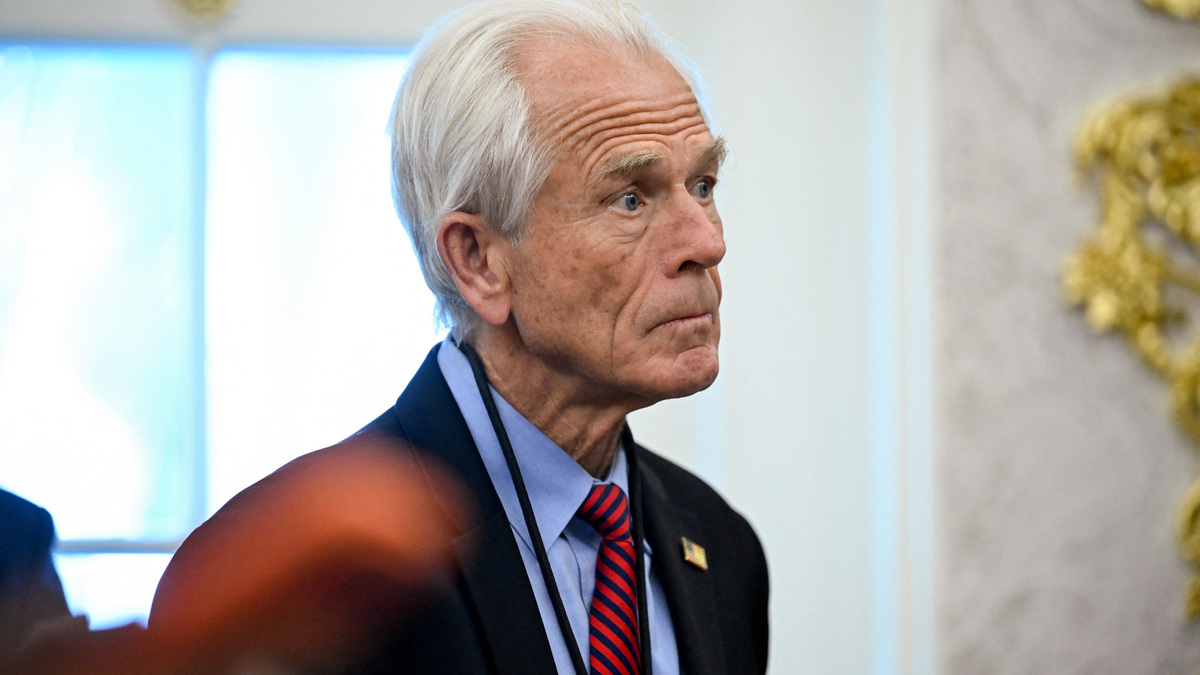U.S. presidential counselor Peter Navarro listens as U.S. President Donald Trump speaks in the Oval Office at the White House in Washington, D.C., U.S., June 11, 2026. REUTERS/Daniel Heuer