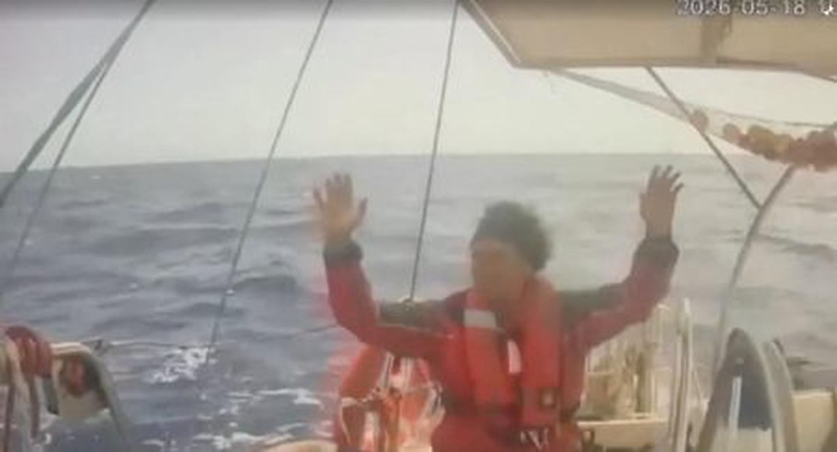 A person raises his hand as an Israeli naval boat intercepts the Global Sumud Flotilla en route to Gaza, in an attempt to deliver aid, at sea May 18, 2026, in this screengrab taken from a handout video. Global Sumud Flotilla/Handout via REUTERS