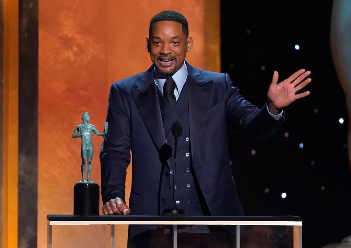 Will Smith accepts the award for best actor in a film for “King Richard” at the 28th annual Screen Actors Guild Awards on Sunday.