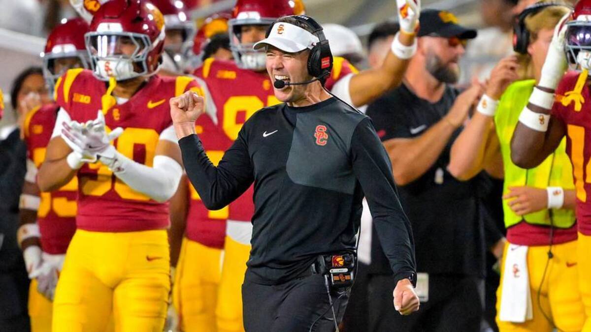  Oct 11, 2025; Los Angeles, California, USA; USC Trojans head coach Lincoln Riley celebrates after kicker Ryon Sayeri (48) hit a 54-yard field goal in the second half against the Michigan Wolverines at United Airlines Field at the Los Angeles Memorial Coliseum. Mandatory Credit: Jayne Kamin-Oncea-Imagn Images | Jayne Kamin-Oncea-Imagn Images 