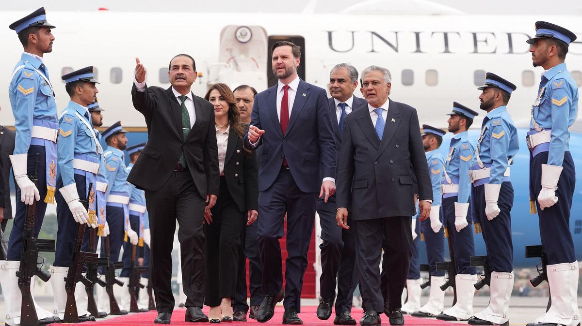 U.S. Vice President JD Vance, middle, walks with Pakistan's Chief of Defense Forces and Chief of Army Staff Field Marshall Asim Munir, left, and Pakistani Deputy Prime Minister and Foreign Minister Mohammad Ishaq Dar after arriving for talks with Iranian officials in Islamabad on Saturday, April 11, 2026. (Jacquelyn Martin/Pool/AFP/Getty Images/TNS)