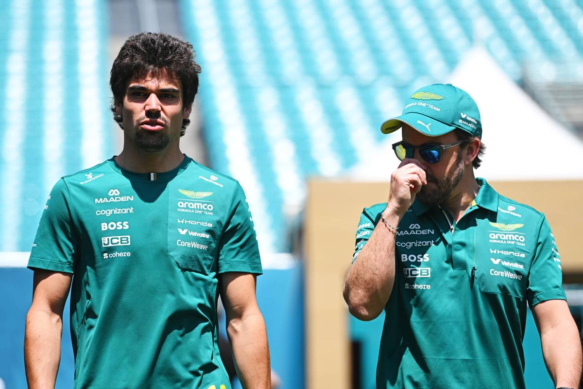  Lance Stroll and Fernando Alonso walk in the Paddock during the 2026 F1 Miami Grand Prix previews. Photo by Rudy Carezzevoli/Getty Images
