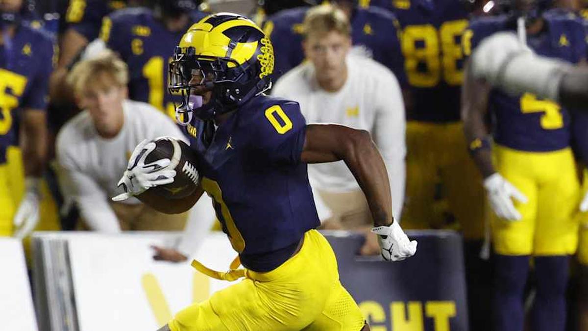  Aug 30, 2025; Ann Arbor, Michigan, USA; Michigan Wolverines wide receiver Semaj Morgan (0) runs the ball in the first half against the New Mexico Lobos at Michigan Stadium. Mandatory Credit: Rick Osentoski-Imagn Images | Rick Osentoski-Imagn Images 