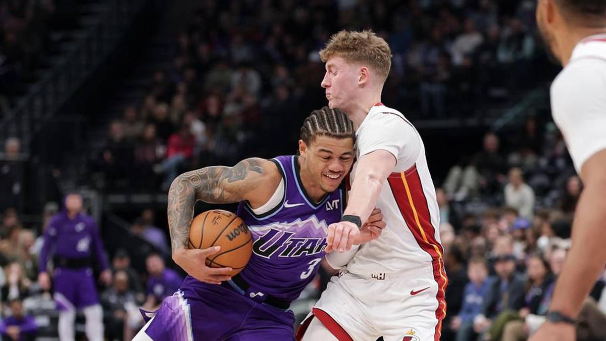  Jan 24, 2026; Salt Lake City, Utah, USA; Utah Jazz guard Keyonte George (3) runs into Miami Heat guard Kasparas Jakučionis (25) during the second half at Delta Center. Mandatory Credit: Chris Nicoll-Imagn Images | Chris Nicoll-Imagn Images 