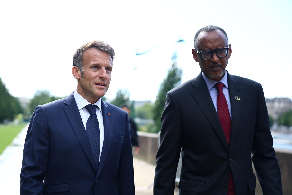 French President Emmanuel Macron and Rwandan President Paul Kagame arrive to attend the inauguration ceremony of the Habib-Bourgiba esplanade along the River Seine, a new memorial site paying tribute to the victims of the Rwanda's genocide, in Paris, France, June 2, 2026. REUTERS/Sarah Meyssonnier/Pool