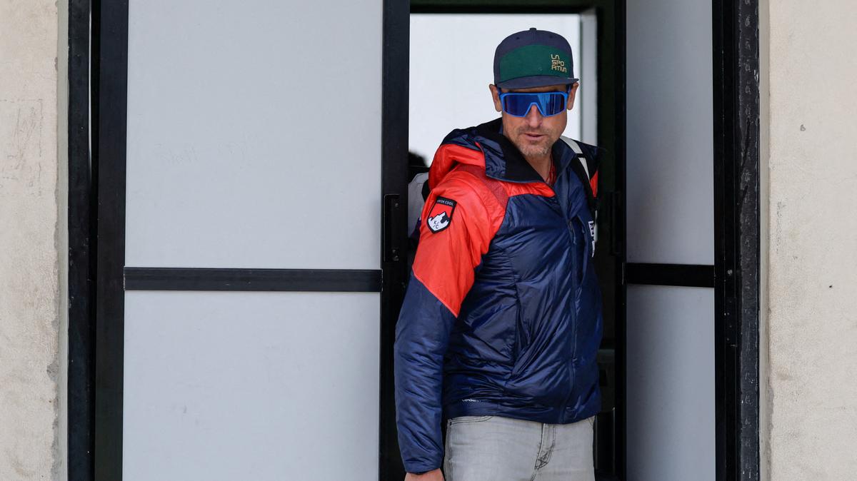 FILE PHOTO: British climber Kenton Cool arrives at the aiport in Kathmandu following his 20th ascent of Mount Everest, the most by any foreign climber, Nepal, May 24, 2026. REUTERS/Navesh Chitrakar/File Photo