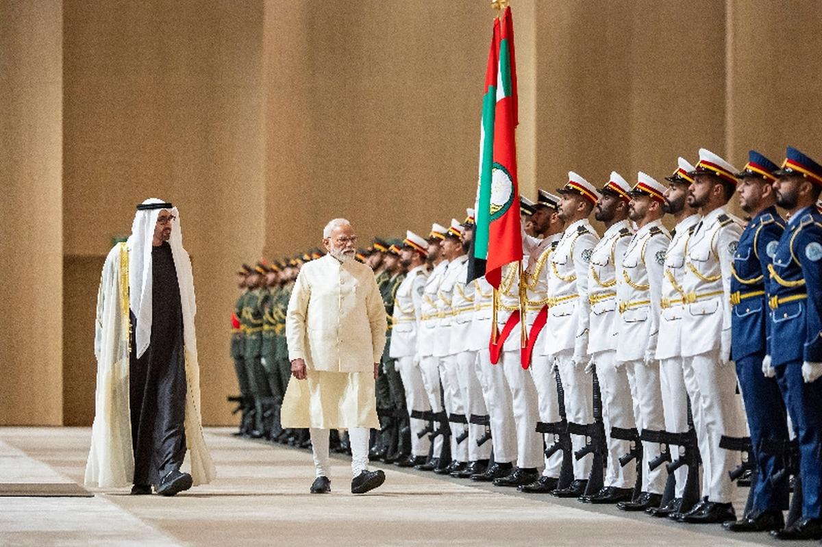 President of the United Arab Emirates Mohamed bin Zayed Al Nahyan and Indian Prime Minister Narendra Modi inspect the UAE Armed Forces honour guards during an official visit at the Presidential Airport, in Abu Dhabi, United Arab Emirates May 15, 2026. Ryan Carter/UAE Presidential Court/Handout via REUTERS