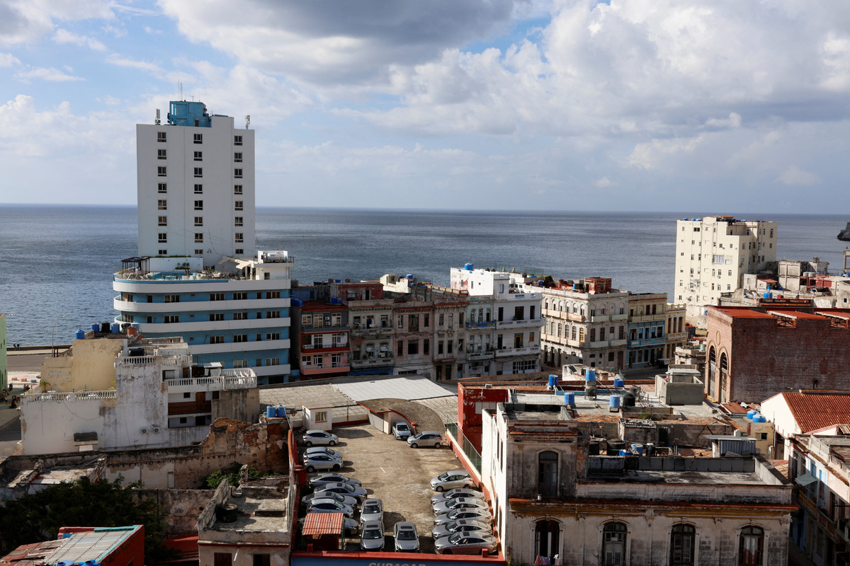 A parking lot for tourist rental cars on a rooftop amidst residential buildings before the Cuban government presents far-reaching economic measures that could mark the most significant shift toward a market economy since the 1959 revolution, in Havana, Cuba June 17, 2026. REUTERS/Norlys Perez