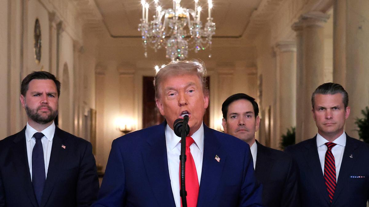 President Donald Trump addresses the nation, alongside Vice President JD Vance (left), U.S. Secretary of State Marco Rubio (second right) and U.S. Secretary of Defense Pete Hegseth (right), from the White House in Washington, D.C., on June 21, 2025, following the announcement that the U.S. bombed nuclear sites in Iran. (Carlos Barria/Pool/AFP/Getty Images/TNS)