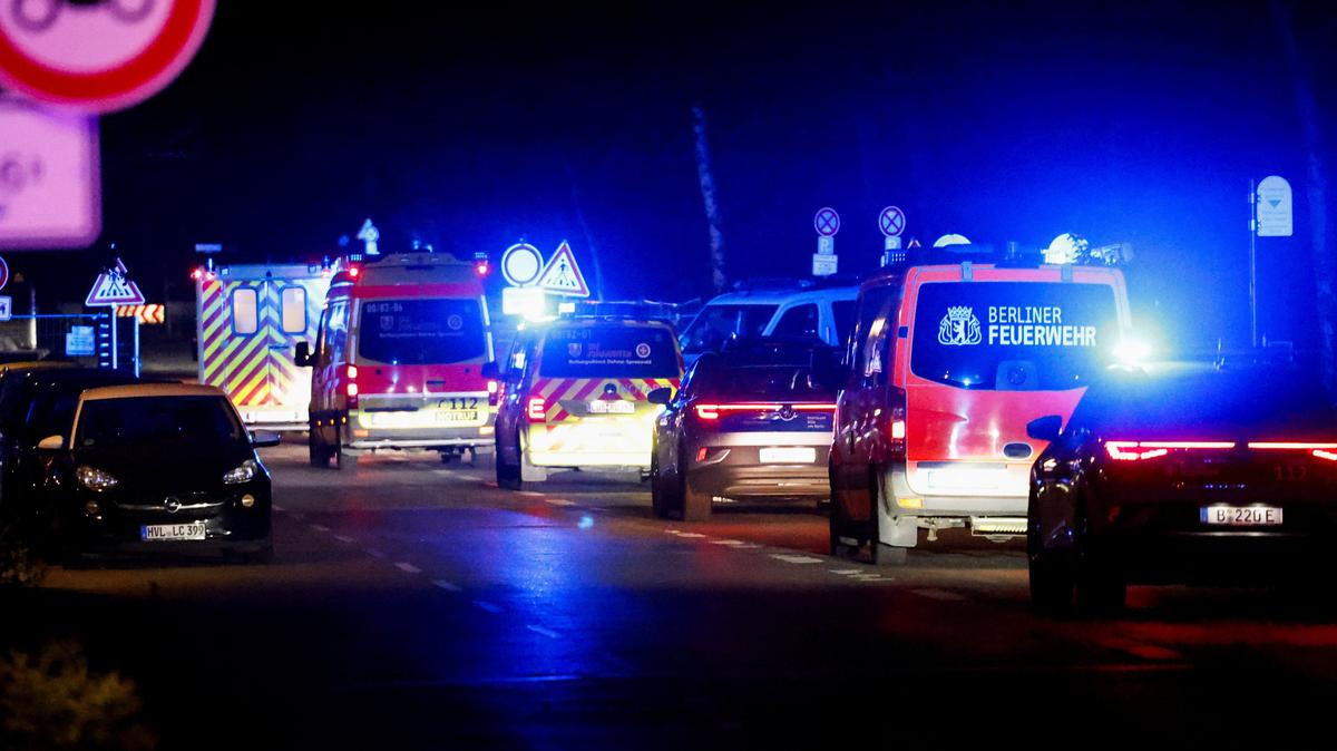 A convoy with an ambulance believed to be carrying an American health worker, who has been brought to Germany for treatment after contracting Ebola in the Democratic Republic of Congo, arrives at the Charite University Hospital in Berlin, Germany, May 20, 2026.    REUTERS/Axel Schmidt