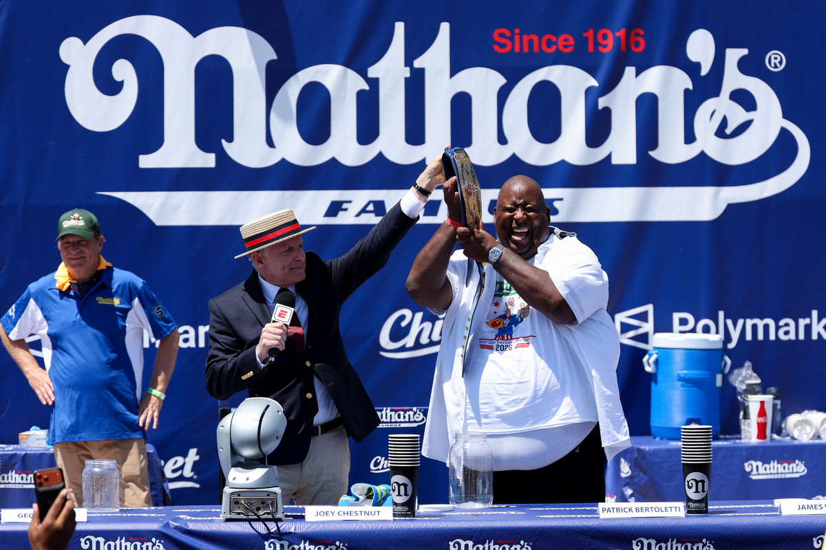 Eric James “Badlands” Booker reacts after winning the lemonade chugging competition at the 2026 Nathan's Famous International Hot Dog Eating Contest, at Coney Island, Brooklyn in New York City, U.S., July 4, 2026. REUTERS/Jordan Tovin
