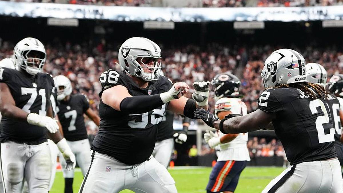  Sep 28, 2025; Paradise, Nevada, USA; Las Vegas Raiders running back Ashton Jeanty (2) celebrates a touchdown with center Jackson Powers-Johnson (58) during the first quarter against the Chicago Bears at Allegiant Stadium. Mandatory Credit: Stephen R. Sylvanie-Imagn Images | Stephen R. Sylvanie-Imagn Images 