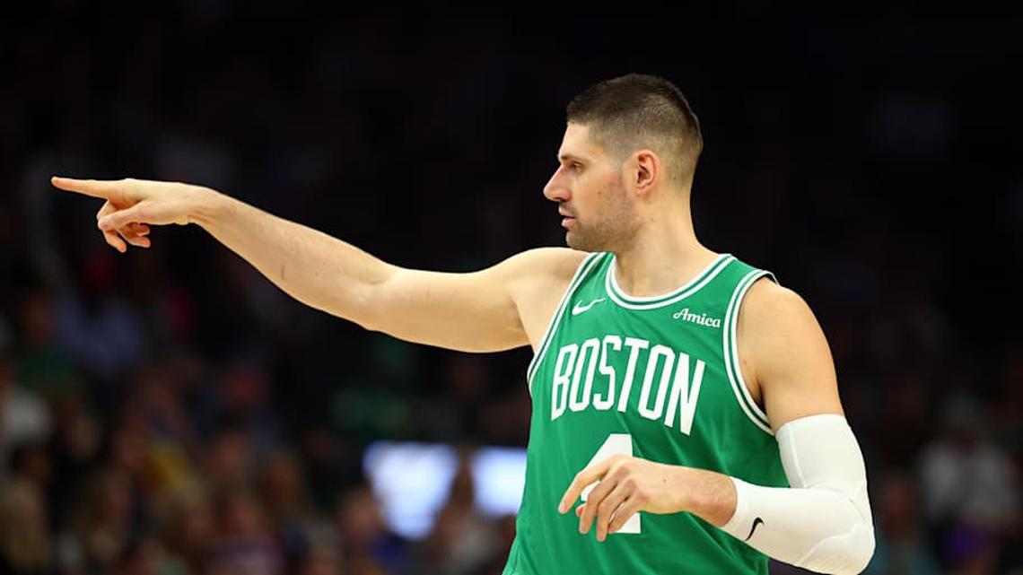  Feb 24, 2026; Phoenix, Arizona, USA; Boston Celtics center Nikola Vucevic (4) reacts against the Phoenix Suns in the first half at Mortgage Matchup Center. | Mark J. Rebilas-Imagn Images 