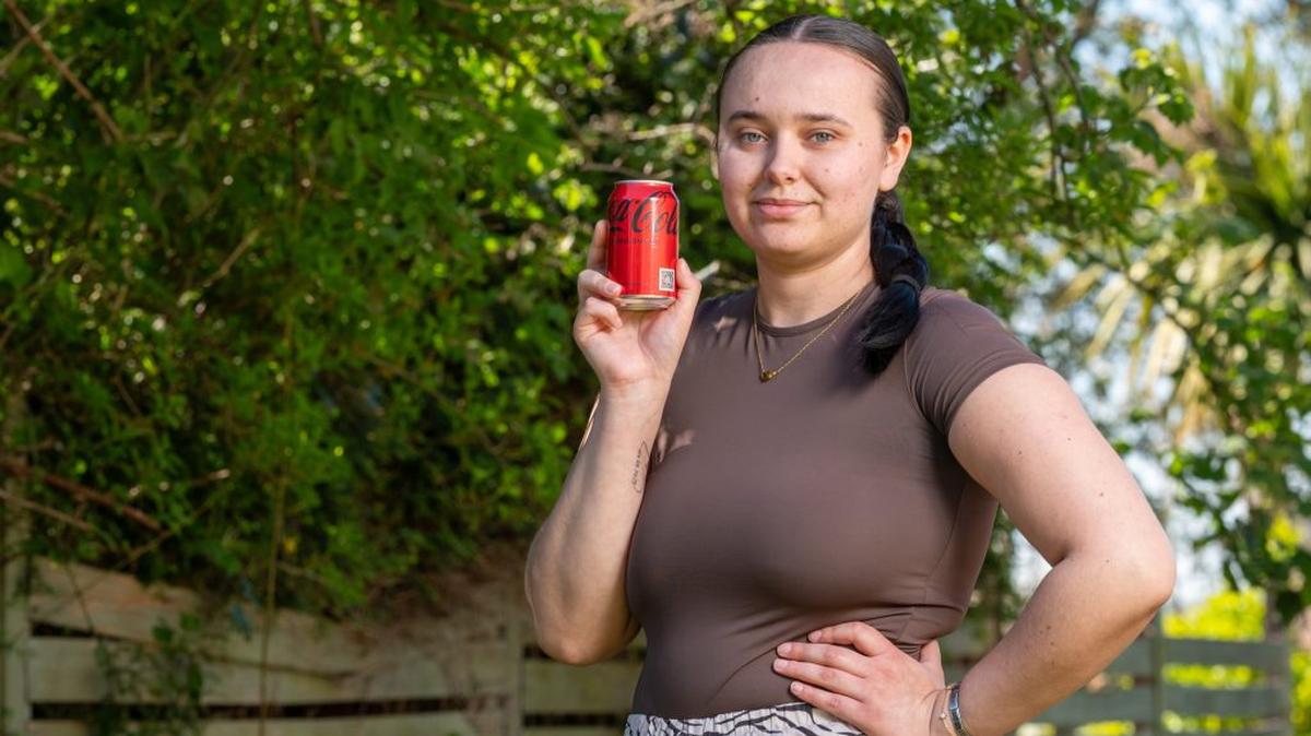 Caitlin Jones, 20, was diagnosed with a condition that left her unable to burp. (Charley Atkins via SWNS). 