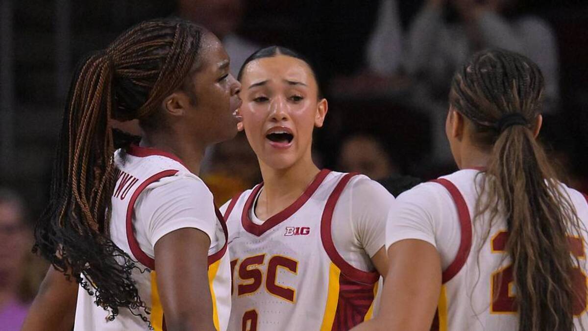 Jan 29, 2026; Los Angeles, California, USA; USC Trojans forward Vivian Iwuchukwu (0), guard Jazzy Davidson (9) and guard Kara Dunn (25) celebrate after a basket in the second half against the Iowa Hawkeyes at Galen Center. Mandatory Credit: Jayne Kamin-Oncea-Imagn Images | Jayne Kamin-Oncea-Imagn Images 