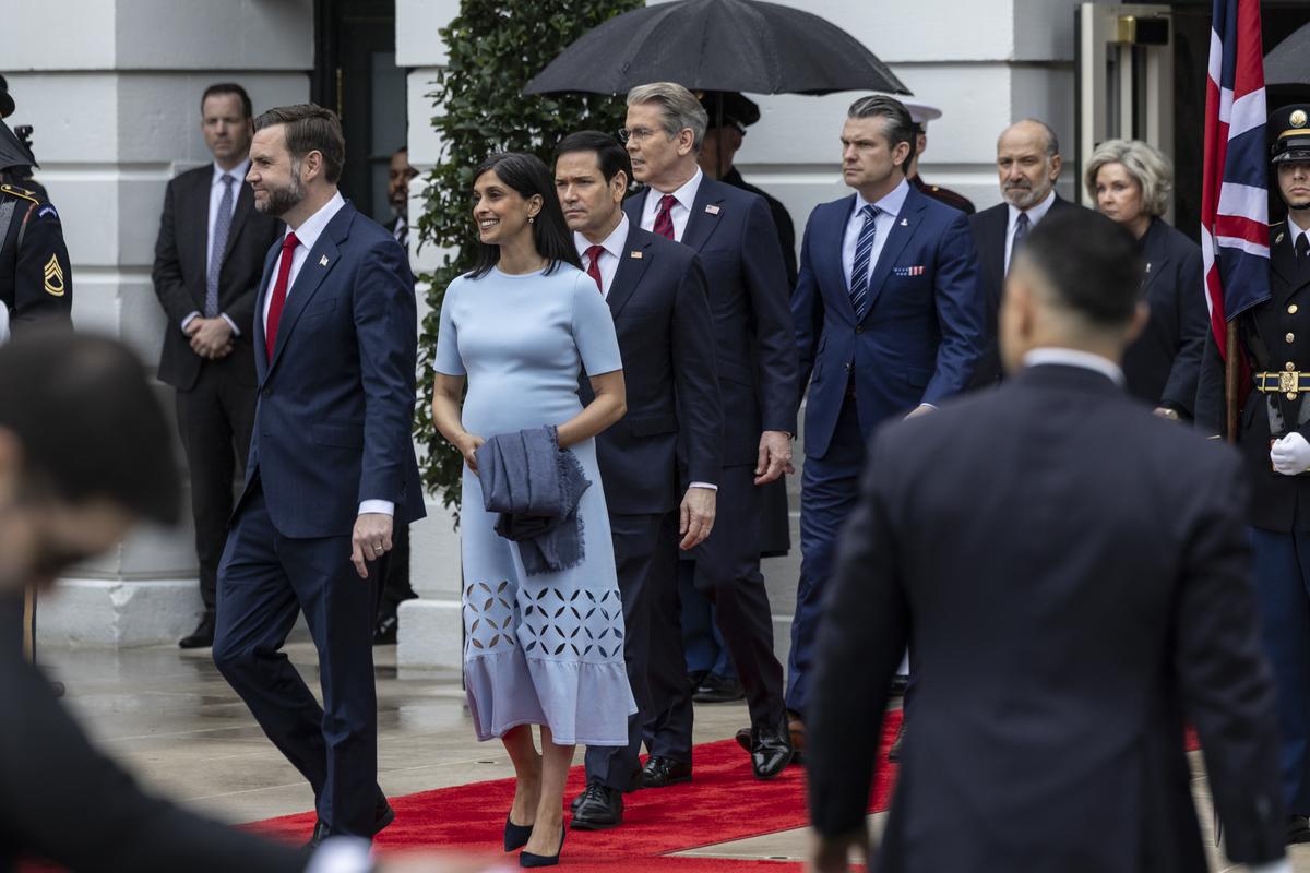 Vice President JD Vance and second lady Usha Vance arrive with members of President Donald Trump's cabinet for an arrival ceremony for King Charles III and Queen Camilla on the South Lawn of the White House in Washington, on Tuesday, April 28, 2026. From left: Vice president JD Vance, second lady Usha Vance, Secretary of State Marco Rubio, Treasury Secretary Scott Bessent, Secretary of Defense Pete Hegseth, Secretary of Commerce Howard Lutnick and White House Chief of Staff Susie Wiles. (Anna Rose Layden/The New York Times)