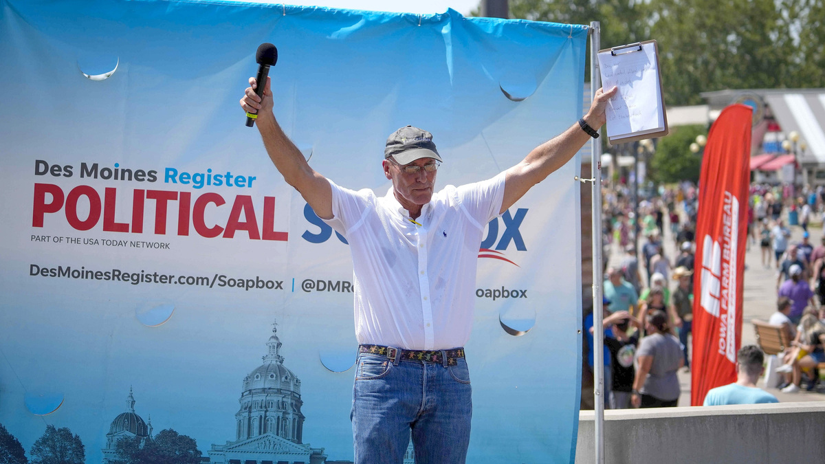 Rick Stewart, Iowa Libertarian candidate for governor, speaks at the Des Moines Register Political Soapbox during the Iowa State Fair in on Saturday, Aug. 13, 2022, in Des Moines.
