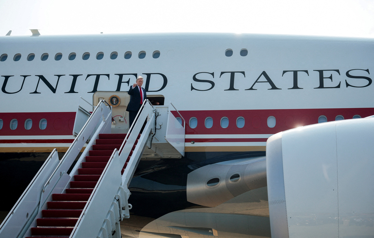 U.S. President Donald Trump gestures as he boards the new Air Force One, a plane gifted by the Qatari government, at Joint Base Andrews, Maryland, U.S., July 1, 2026. REUTERS/Evan Vucci