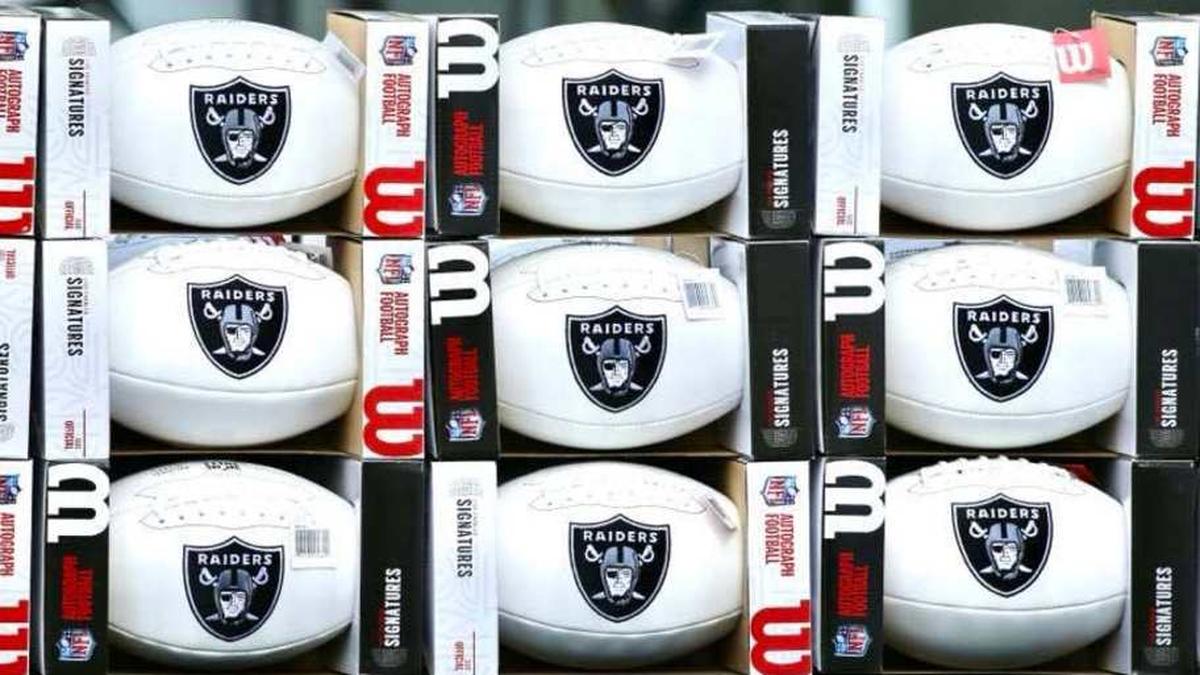  Raider Footballs | Dexter Ernest Wayne Carpenter, On SI 