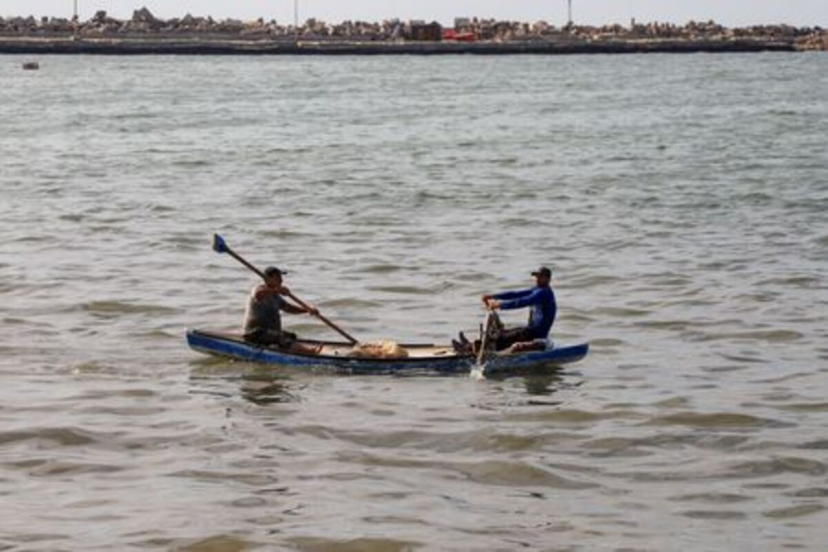 Palestinian fishermen use a skiff off the coast of Gaza City, June 3, 2026. REUTERS/Ebrahim Hajjaj