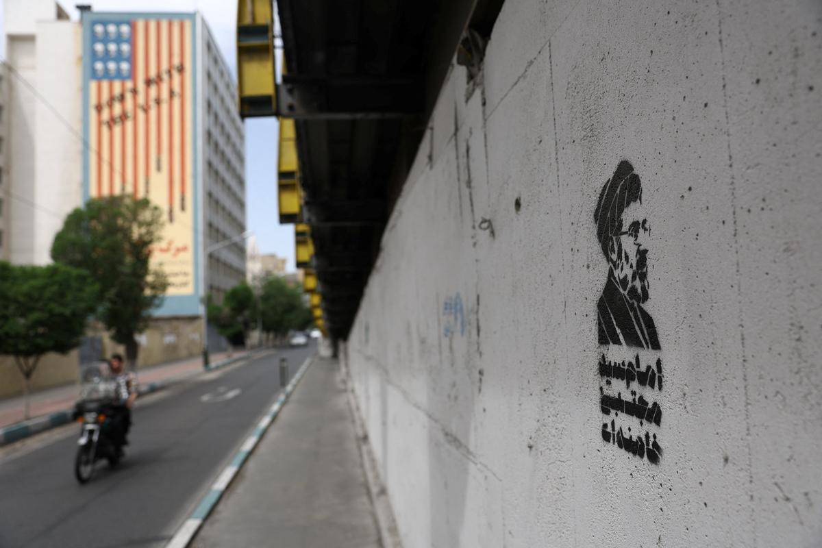 Graffiti of Iran's new Supreme Leader Mojtaba Khamenei, on a street in Tehran, Iran, May 8, 2026. Majid Asgaripour/WANA (West Asia News Agency) via REUTERS