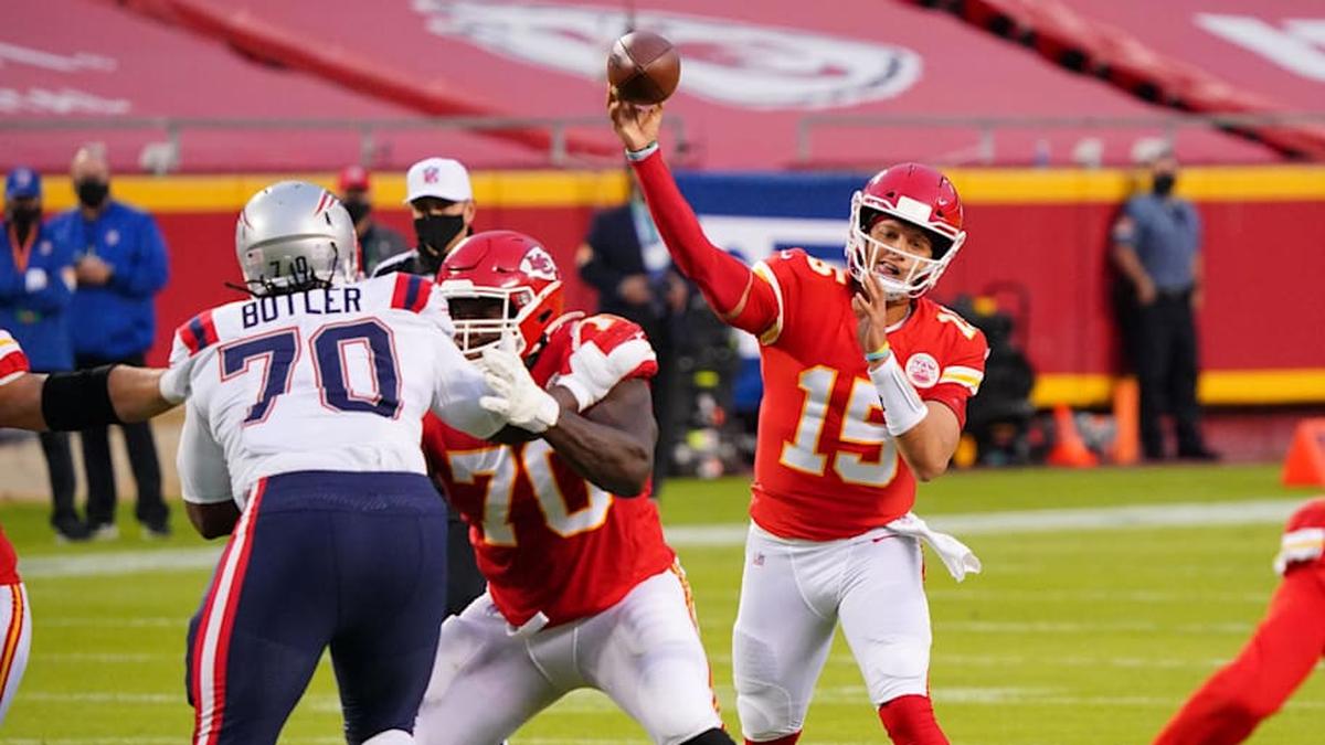  Oct 5, 2020; Kansas City, Missouri, USA; Kansas City Chiefs quarterback Patrick Mahomes (15) throws a pass against the New England Patriots during the second quarter of a NFL game at Arrowhead Stadium. Mandatory Credit: Jay Biggerstaff-Imagn Images | Jay Biggerstaff-Imagn Images 