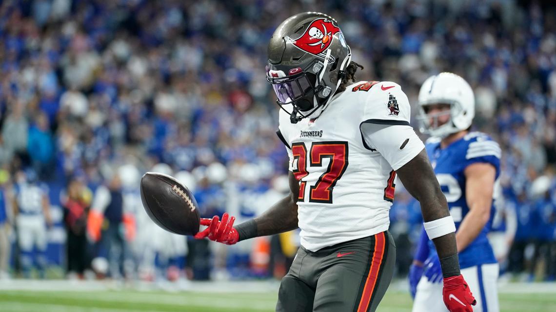 Tampa Bay Buccaneers’ Ronald Jones (27) reacts after rushing for a touchdown during the second half of an NFL football game against the Indianapolis Colts, Sunday, Nov. 28, 2021, in Indianapolis. (AP Photo/Michael Conroy)