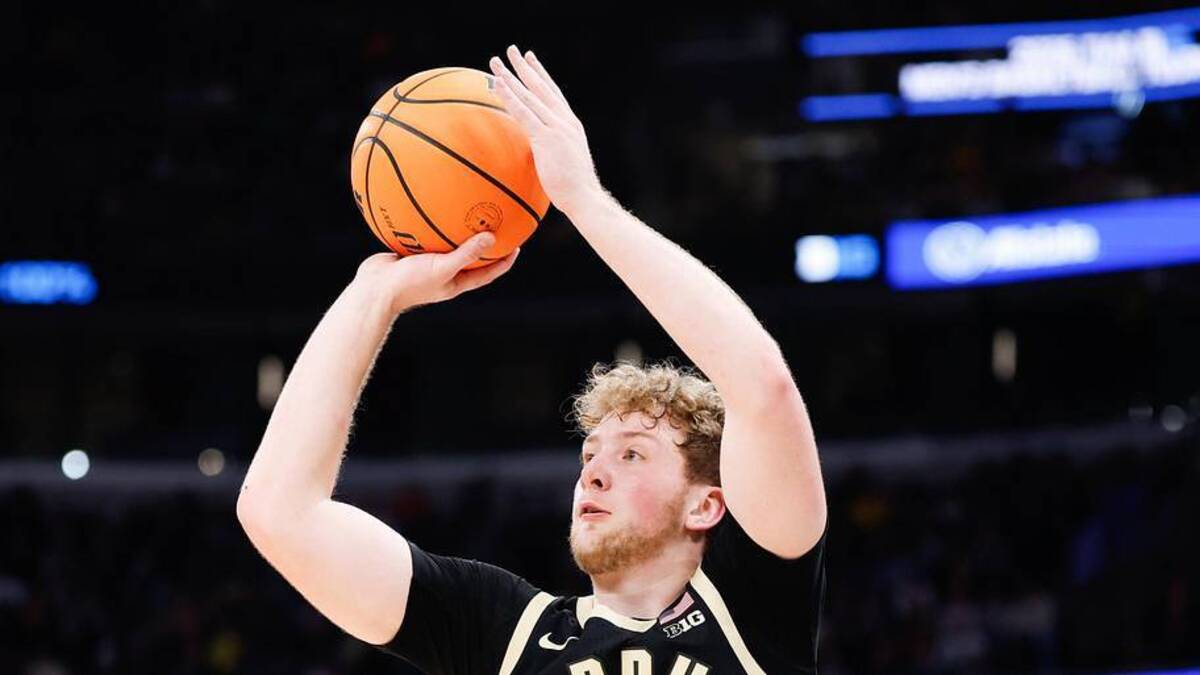  Mar 15, 2026; Chicago, IL, USA; Purdue Boilermakers guard Jack Benter (14) shoots a free throw during the first half against the Michigan Wolverines during the men's Big Ten Conference Tournament Championship at United Center. Mandatory Credit: Kamil Krzaczynski-Imagn Images | Kamil Krzaczynski-Imagn Images 