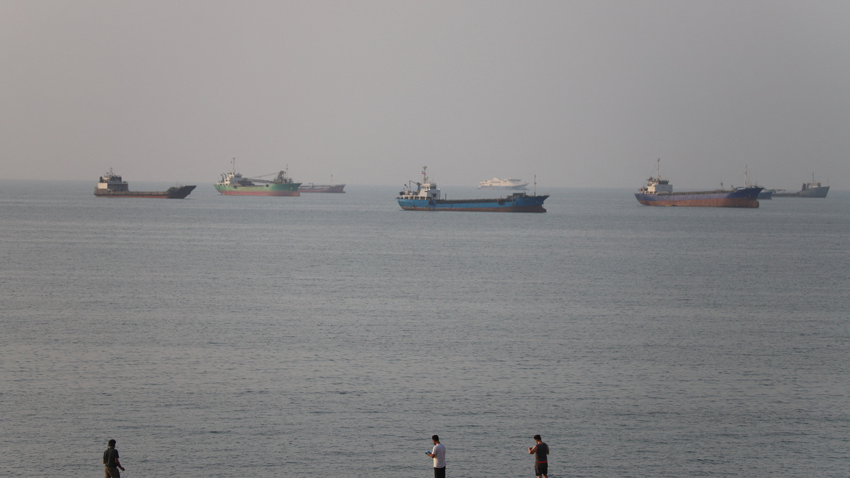Vessels in the Strait of Hormuz near the beach of Bandar Abbas, Iran, June 21, 2026. Amirhosein Khorgooi/ISNA/via WANA (West Asia News Agency)via REUTERS